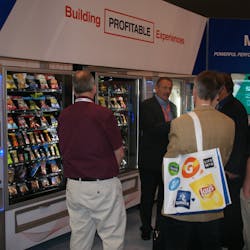 NAMA Show.attendees visit Crane&rsquo;s booth.