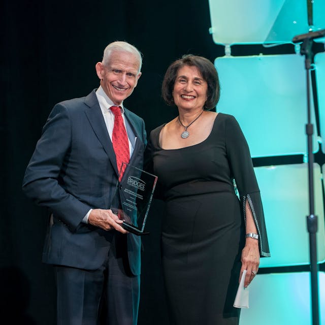 Rohini Anand, Sodexo Global Chief Diversity Officer and SVP Corporate Responsibility North America receiving the award from Richard Marriott, Chairman, Marriott Foundation Board of Trustees &amp; Chairman of the Board, Host Hotels &amp; Resorts