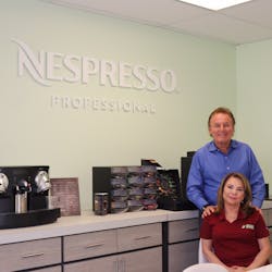 Sean Curtis and Barbara Curtis Smalley in the Nespresso tasting room at Coffee Ambassador.