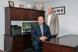 Lincoln County Vending owner Dan Holt (left) and Kevin Posey, operations manager for Lincoln County Vending, value using technology to enhance both employees' and customers' experience with the company. Lincoln County Vending owner Dan Holt (left) and Kevin Posey, operations manager for Lincoln County Vending, value using technology to enhance both employees' and customers' experience with the company.