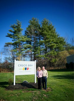 On a brisk autumn day with clear blue skies, Ted and Niki Morton are in front of the company&apos;s Lewiston corporate offices.