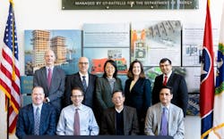 ORNL and leading building equipment industries signed collaboration agreements to improve the energy performance of HVAC systems and investigate alternative refrigerants. Seated from left, Eric Dell, executive vice president, National Automatic Merchandising Association; Stephen Wadle, senior project engineer, Taylor Commercial Foodservice; Hung Pham, integrated technologies director, Emerson Climate Technologies; and Jacques Beaudry-Losique, president, Enginuity Power Systems. Standing from left, Ron Ott, building technologies program manager, ORNL; Moe Khaleel, associate laboratory director, ORNL; Xin Sun, energy transportation science division director, ORNL; Karma Sawyer, building technologies office program manager, DOE; and Tony Bouza, building technologies office technology manager, DOE. ORNL and leading building equipment industries signed collaboration agreements to improve the energy performance of HVAC systems and investigate alternative refrigerants. Seated from left, Eric Dell, executive vice president, National Automatic Merchandising Association; Stephen Wadle, senior project engineer, Taylor Commercial Foodservice; Hung Pham, integrated technologies director, Emerson Climate Technologies; and Jacques Beaudry-Losique, president, Enginuity Power Systems. Standing from left, Ron Ott, building technologies program manager, ORNL; Moe Khaleel, associate laboratory director, ORNL; Xin Sun, energy transportation science division director, ORNL; Karma Sawyer, building technologies office program manager, DOE; and Tony Bouza, building technologies office technology manager, DOE.