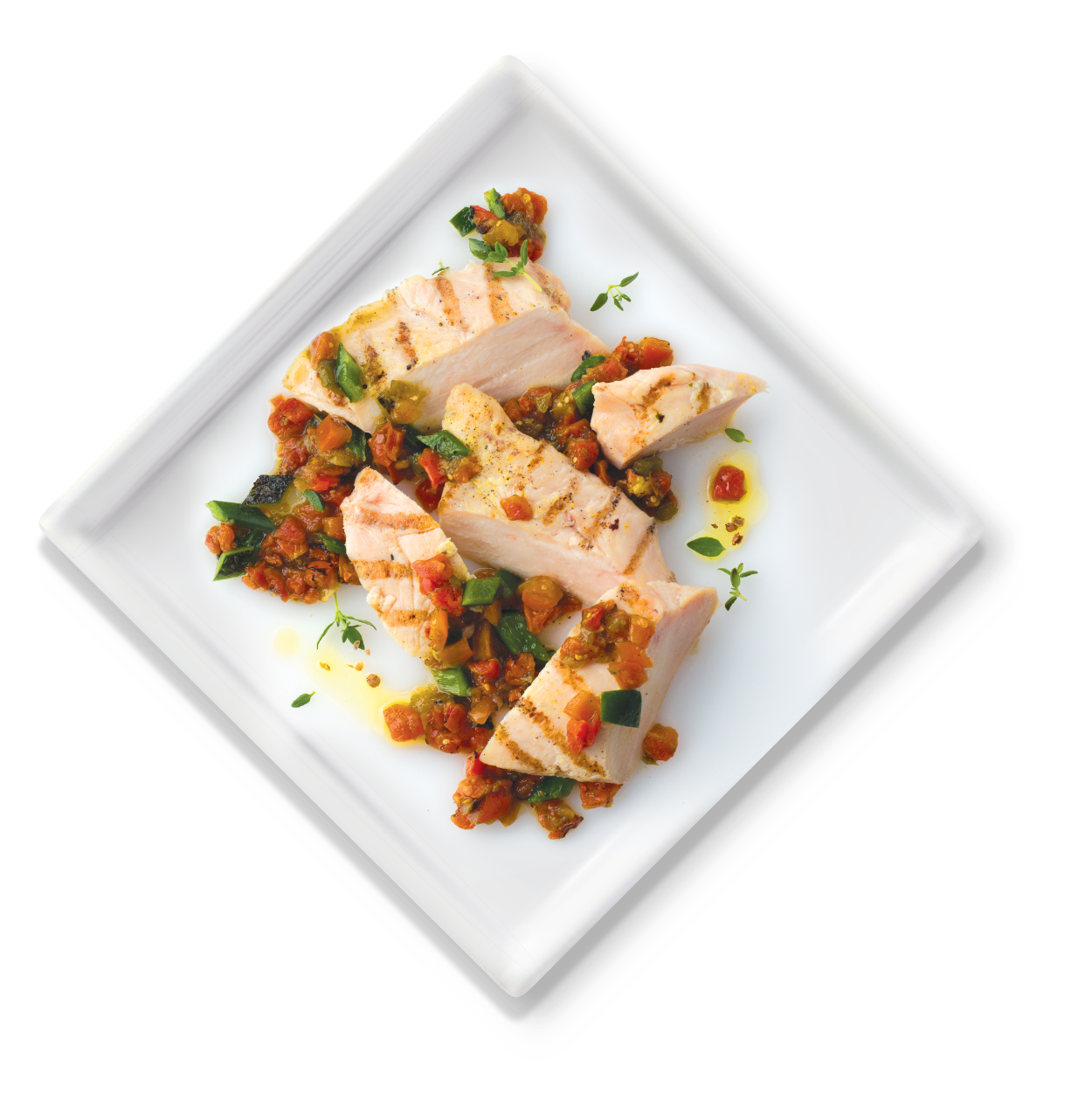 First Chop Grilled Chicken Breast with Fire Roasted Vegetables features seasoned and grilled chicken breast with fire roasted tomatoes, poblano peppers and tomatillos.