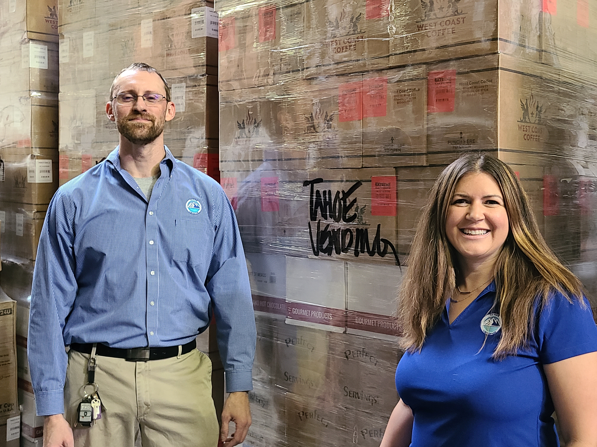 Jarrad Duxbury, Diana Koether, and a large shipment of coffee in the company's northern Nevada warehouse.