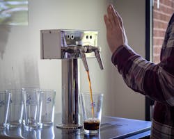 TapWise Touchless dispensing pours using a sophisticated sensor and object analysis for a contactless experience. (Photo: Business Wire)