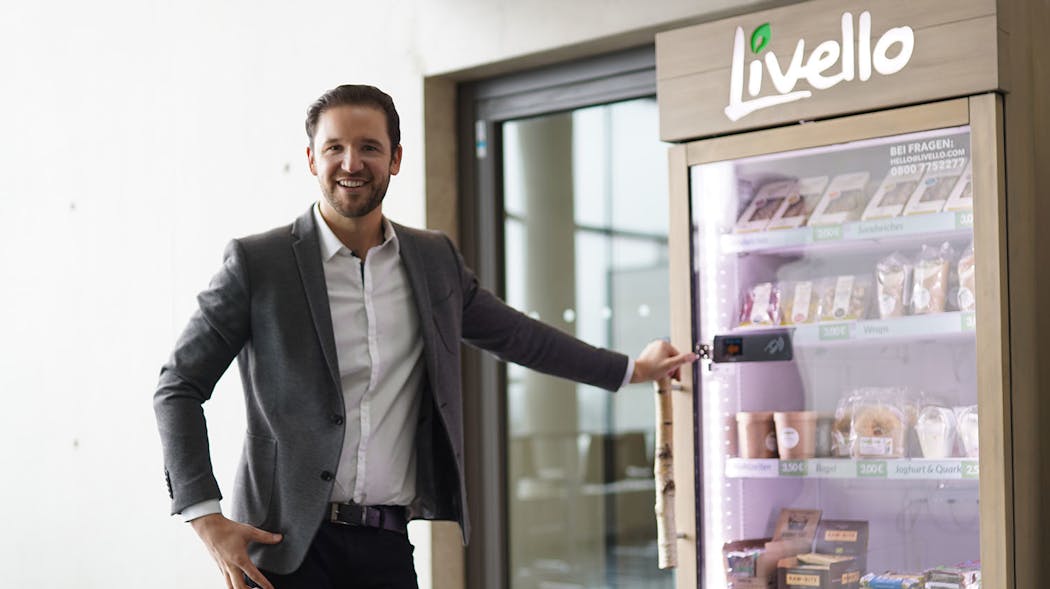 Livello founder and chief executive Alexander Eissing shows of automated fridge.