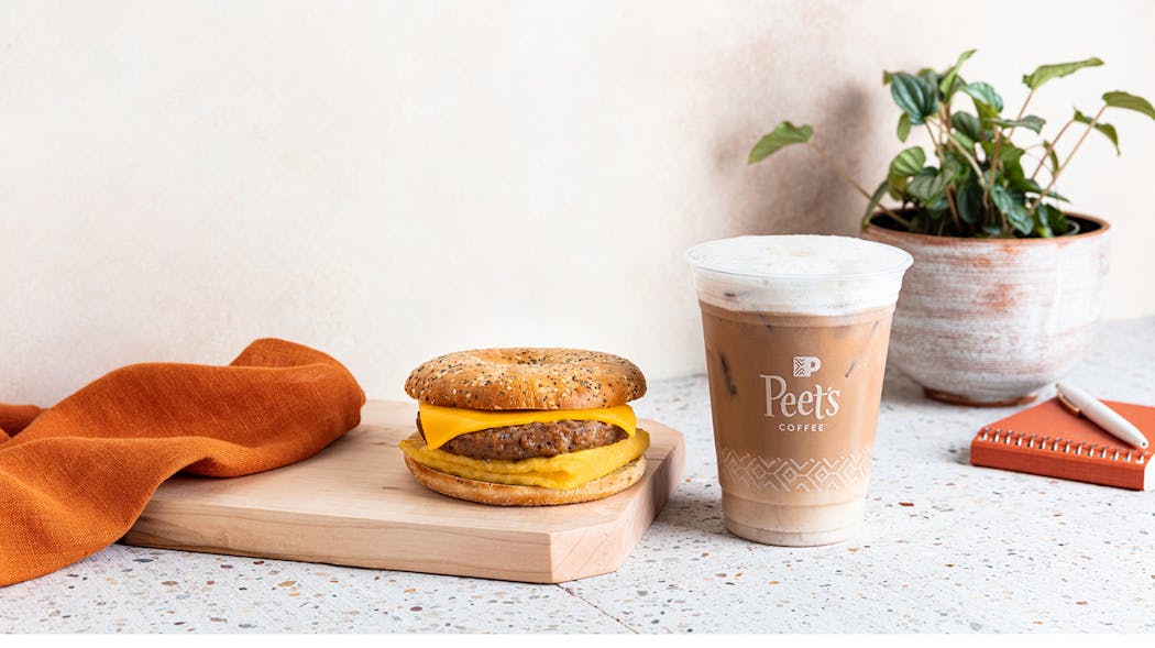 Peet&apos;s Everything plant-based breakfast sandwich is juxtaposed with Peet&apos;s Horchata cold brew oat latte.