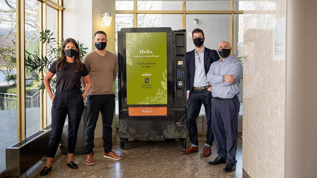White-label vender at Devonshire Properties' Beach Towers provides residents with custom meals 24/7. Pictured here, from left, are Devonshire's Alexandra Shafran and Cody Neal, UpMeals cofounder and chief executive Drew Munro and Devonshire's Jeffrey Shafran.