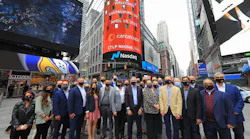 The Cantaloupe team led by chief executive Sean Feeney gather outside the Nasdaq MarketSite located in Midtown Manhattan’s Times Square for celebratory photo on April 19.