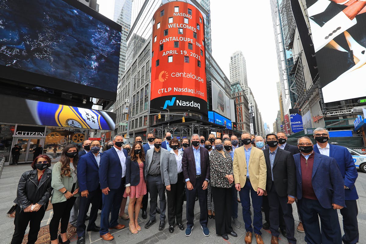 The Cantaloupe team led by chief executive Sean Feeney gather outside the Nasdaq MarketSite located in Midtown Manhattan&rsquo;s Times Square for celebratory photo on April 19.