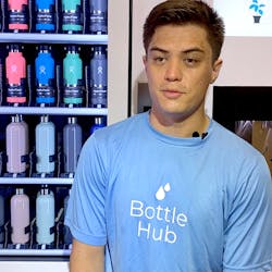 BottleHub founder and chief executive James Trotter shows off kiosk that vends and fills reusable water bottles.