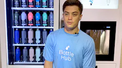 BottleHub founder and chief executive James Trotter shows off kiosk that vends and fills reusable water bottles.
