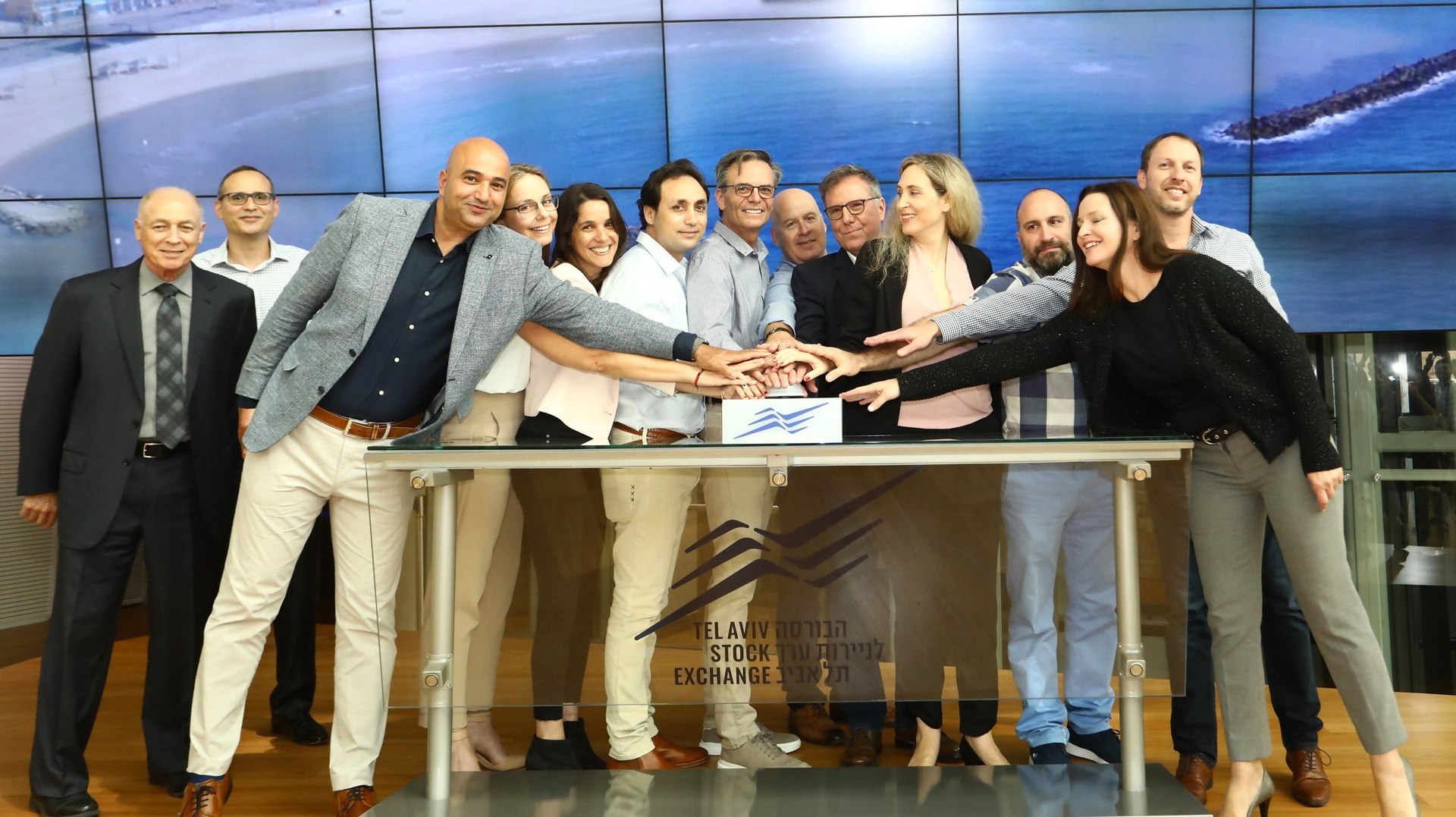 Pictured, from left, are Ella Shechtman, VP HR Nayax; Moshe Orenstein, VP product Nayax; Saffi Keisari, development manager Nayax; Keren Sharir, VP marketing Nayax; Amir Nechmad, cofounder Nayax; Yair Nechmad, CEO, chairman and cofounder Nayax; David Ben-Avi, CTO Nayax; Liron Grosman, CEO Nayax; Tami Erel, CBO Nayax; Michael Galai, chief legal officer Nayax; Ittai Ben-Zeev, CEO TASE; and Amnon Neubach, chairman TASE.