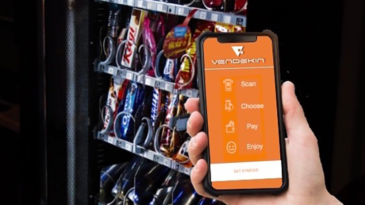 Vendekin&rsquo;s smart vending platform working with a cashless payment app, shown here with a glassfront machine, creates a digital and touch-free experience. The platform also provides real-time data analytics.