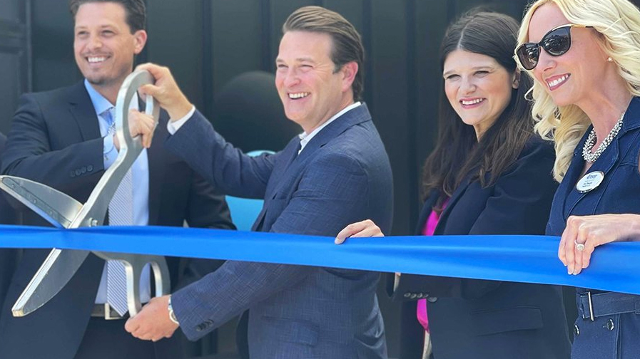 Cutting the ribbon to officially open 365's renovated HQ on June 11, from left, are Troy Mayor Ethan Baker, 365 chief Joseph Hessling, Congresswoman Haley Stevens (MI-District 11) and Troy Chamber of Commerce president Tara Tomcsik-Husa.