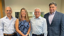 Pictured, from left, are American Food and Vending&rsquo;s COO Jim Roselando Jr., office manager Maria Foresteire, founder and president Jim Roselando Sr. and vice president Patrick Arone.