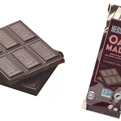 Hershey&apos;s Oat Made chocolate is trialing in two varieties, &apos;extra creamy almond and sea salt&apos; and &apos;classic dark,&apos; sold in 1.55-oz. bars labeled as a &apos;plant-based chocolate confection.&apos; Target is among the select test stores. (Photo: Target)