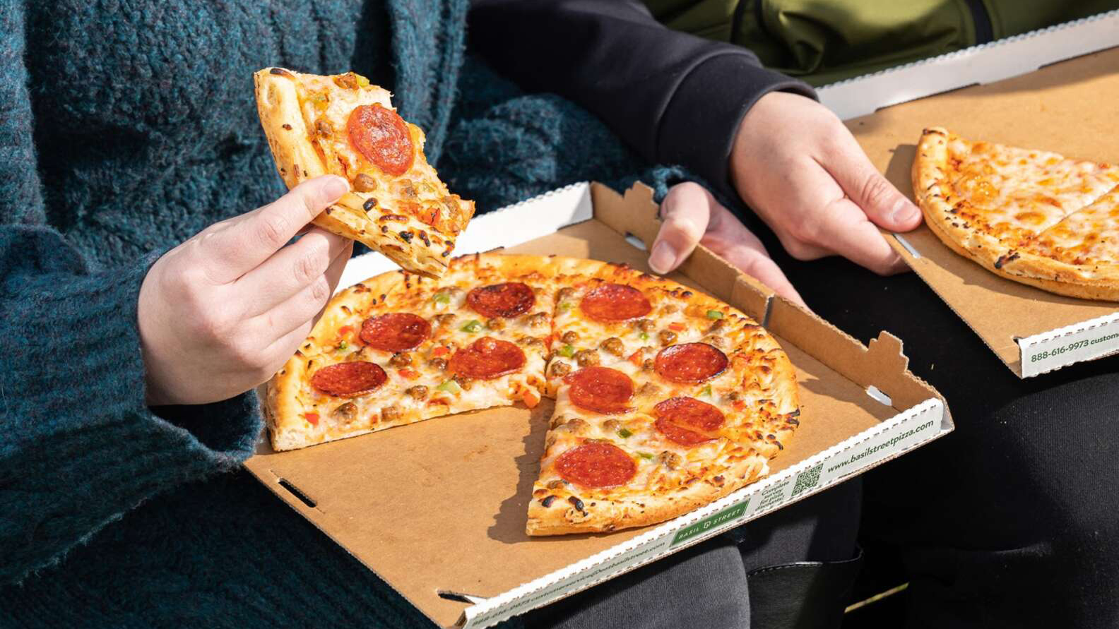 Basil Street Pizza In Box On Lap 617351f7485b0
