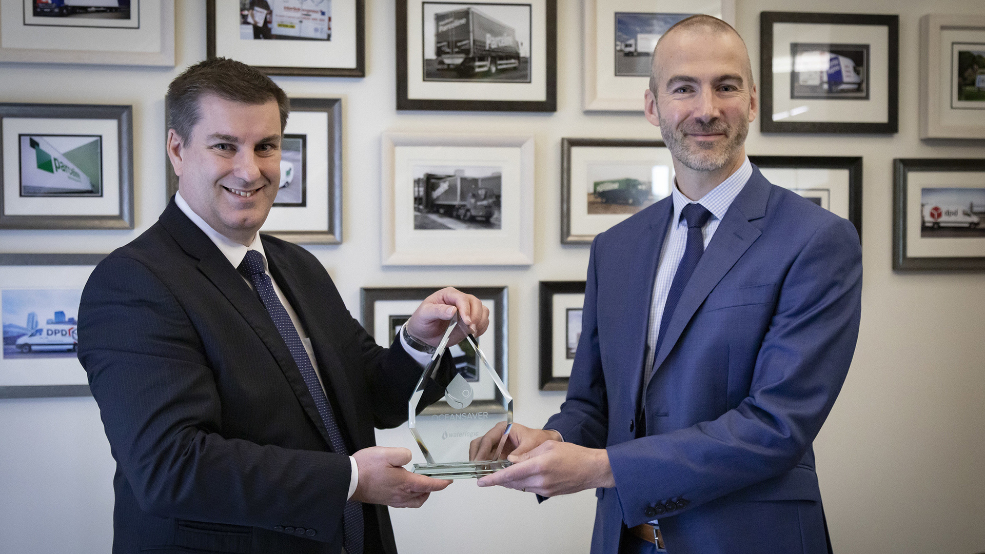 Waterlogic official presents Oceansaver award to Olly Craughan, DPD's head of corporate social responsibility.