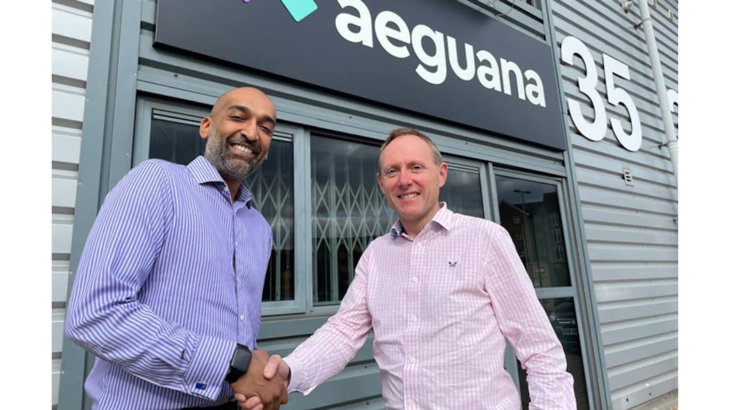 Aeguana chief executive Manish Shah (l.) and FDC portfolio director Clive Broadhutst shake on a successful year in unattended retail.