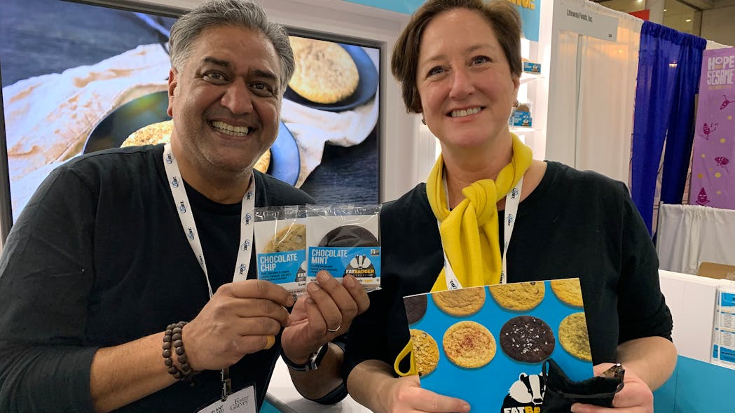 Fat Badger&apos;s vegan cookies in single-serve packs were among the many products for vending and micro markets on display at mid-December&apos;s Plant Based World Expo. Pictured here are Fat Badger&apos;s Karim and Gretchen Dossa.