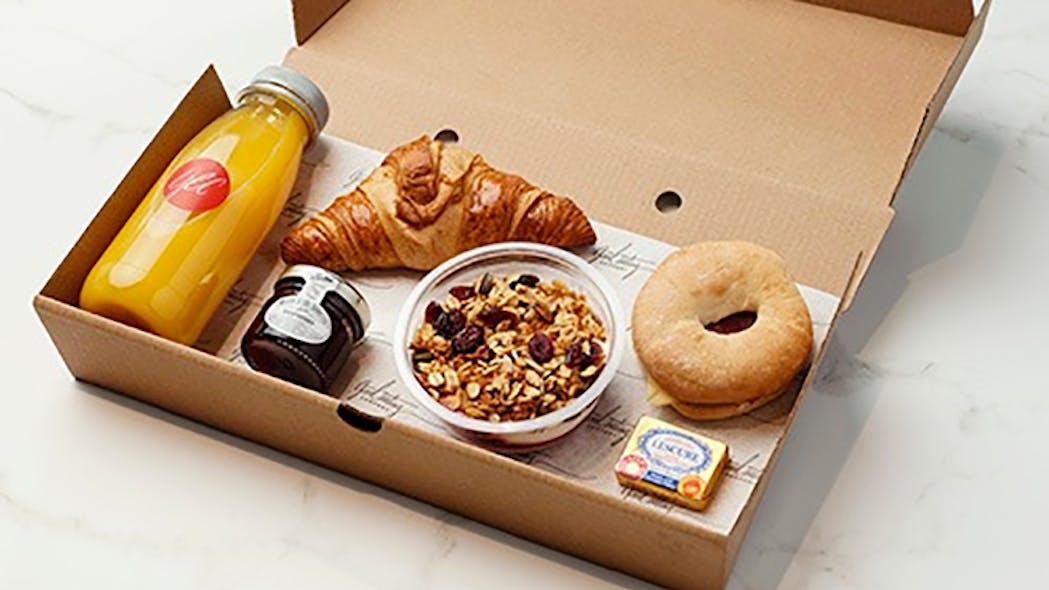 GEC&apos;s Good Start Breakfast Box includes dry cure ham, cheese, tomato, mini bagel and croissant, granola and yogurt pot, strawberry conserve and freshly squeezed orange juice. Sells for &pound;12.30 (about $16.80).