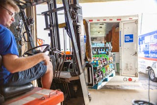 Ryan Jimerson loads a truck for the day&rsquo;s deliveries that he prekitted using Parlevel technology and reorganized warehouse and new procedures that the company recently put into action.