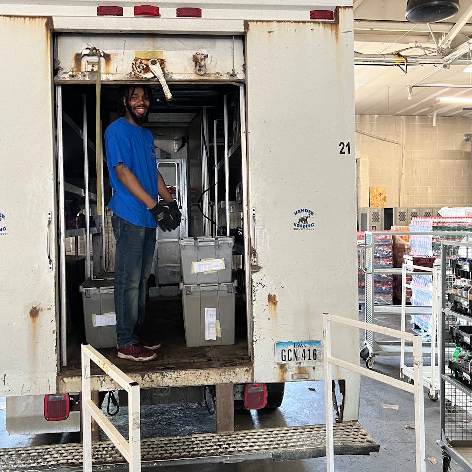 Marcus loads his truck for the day&rsquo;s deliveries.