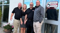 Larry Bach, Barbie Nesser, Tom Nesser and Tom Bach at the main entrance of their Rochester, New York, headquarters. Larry Bach, Barbie Nesser, Tom Nesser and Tom Bach at the main entrance of their Rochester, New York, headquarters.