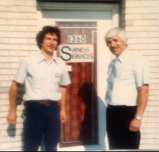 Tom Nesser with his father Tom Sr. circa 1980 at the first Sirness Services business site.