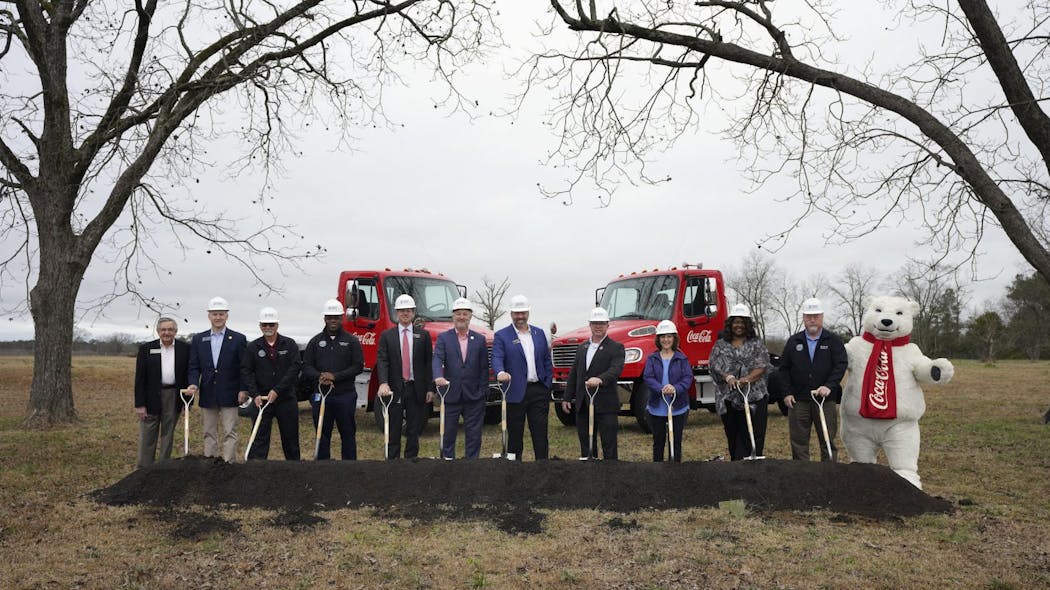 Coca-Cola United associates and Macon-Bibb County officials sport hard hats at the Feb. 17 groundbreaking ceremony for Macon Coca-Cola&rsquo;s $85 million expansion.