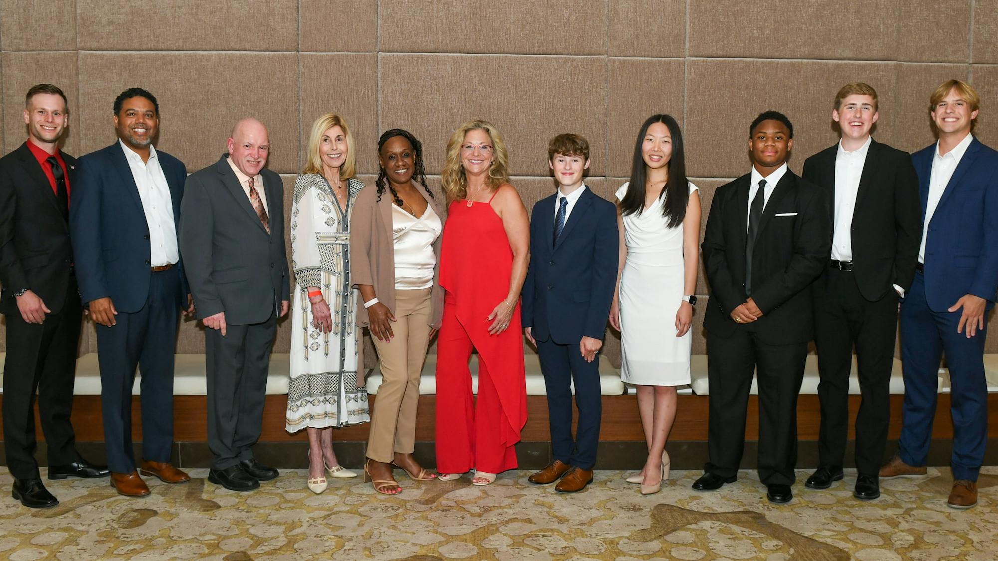 Sodexo Stop Hunger Foundation's Roxanne Moore with the 2024 Stephen J. Brady Stop Hunger Scholars and Heroes of Everyday Life.