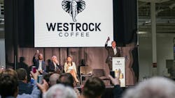 Scott Ford, co-founder and CEO of Westrock Coffee, raises a ready-to-drink can produced by Westrock Coffee to officially toast the grand opening of the company&apos;s RTD facility in Conway, Arkansas on June 13, 2024. From left, he is pictured with Will Ford, group president of operations; Joe T. Ford, co-founder and chairman; and Arkansas Gov. Sarah Huckabee Sanders.