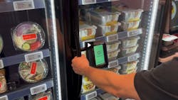 A screen capture from the Micromart video shows the cooler is secure until payment is provided. A screen capture from the Micromart video shows the cooler is secure until payment is provided.