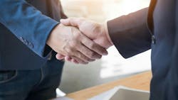 two men shaking hands merger acquisition two men shaking hands merger acquisition