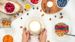 breakfast background with oatmeal coffee, berries, egg, nuts, coffee breakfast background with oatmeal coffee, berries, egg, nuts, coffee