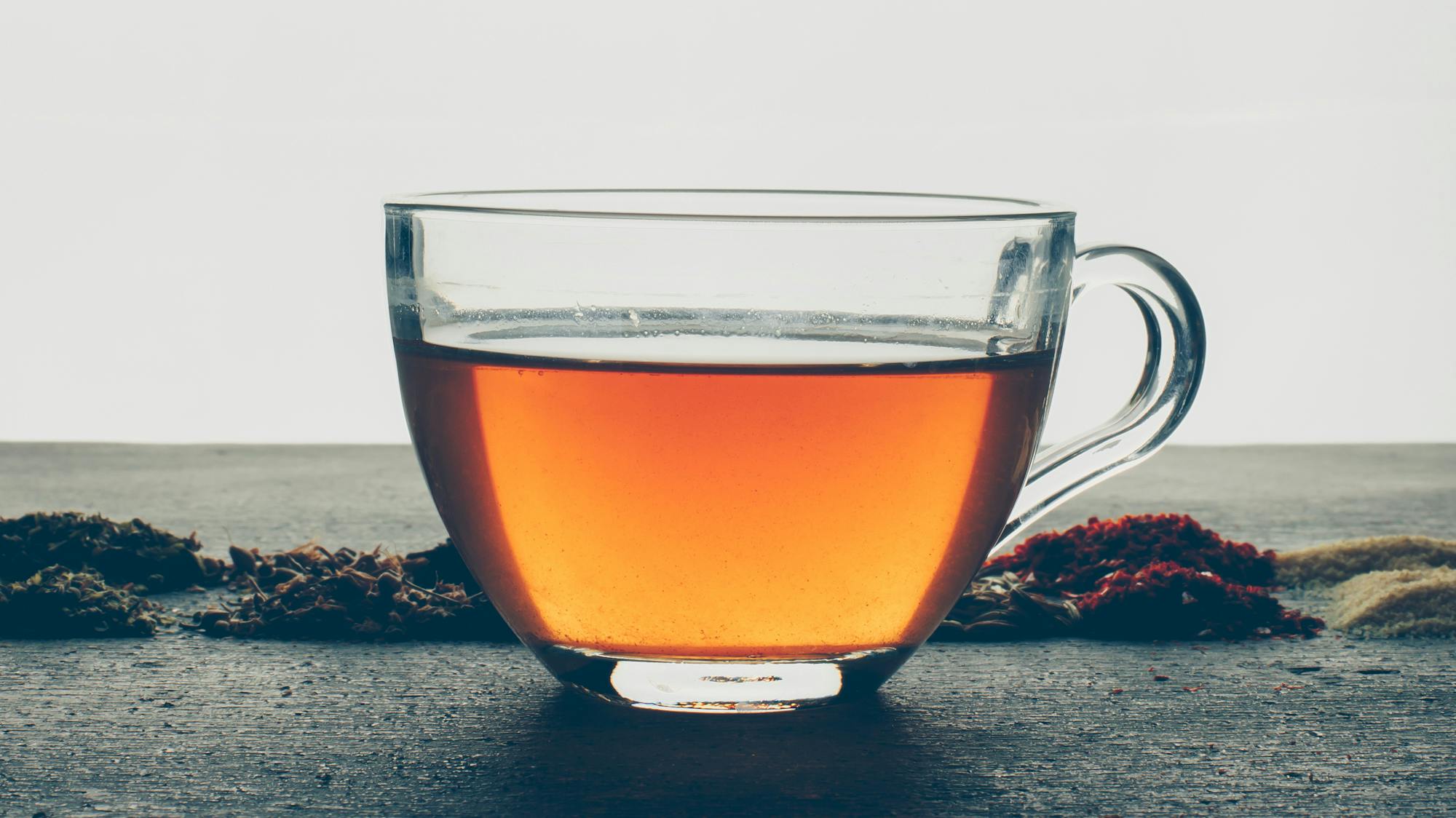 tea with dried herbs side view stock photo