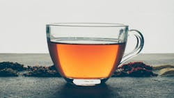 tea with dried herbs side view stock photo tea with dried herbs side view stock photo