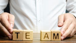 Team spelled out in blocks personnel announcement Team spelled out in blocks personnel announcement