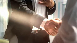 Businessman handshake for teamwork of business merger and acquisition. Business background of businessmen have handshaking in greeting of business deal of merger and acquisition agreement.