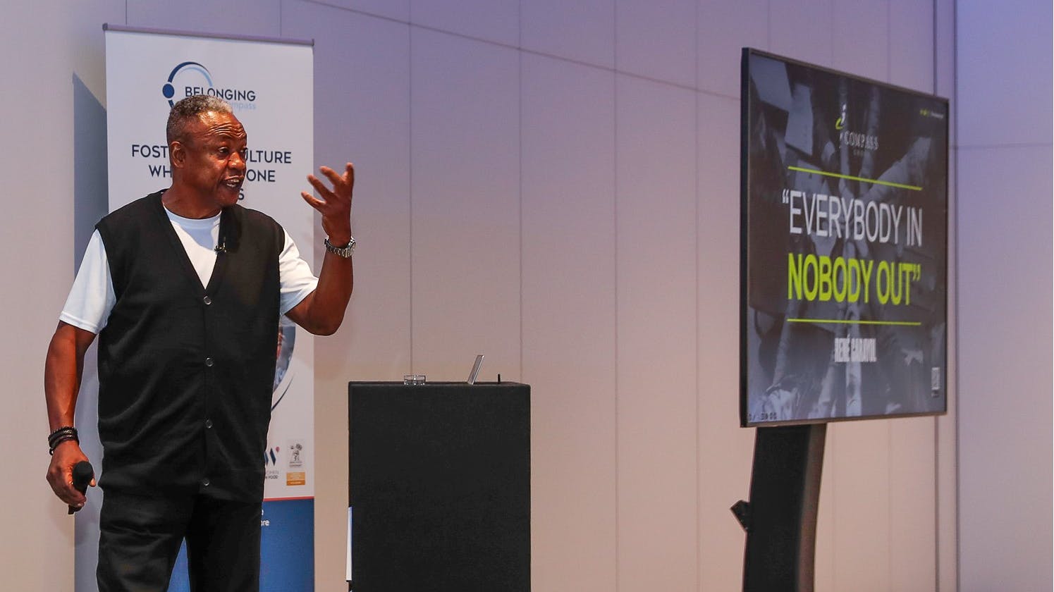 Ren&eacute; Carayol MBE, an executive coach, addresses team members at Compass Group UK & Ireland during the keynote session about driving inclusion and motivating staff toward shared goals.