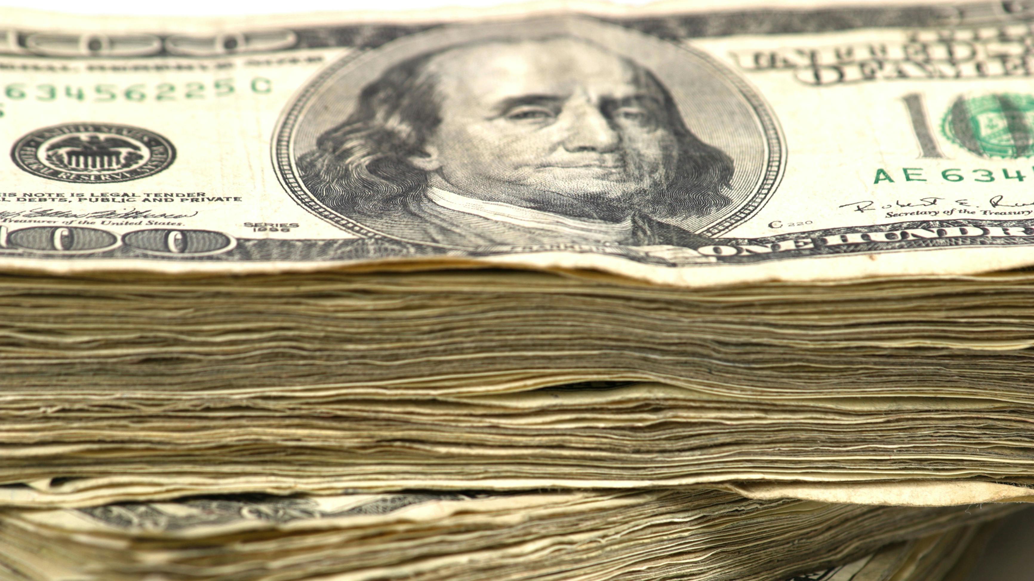 stack of dollar bills