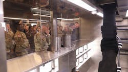 Brigadier Gen. Jin Pak views the new autonomous robot inside Market 19 Brigadier Gen. Jin Pak views the new autonomous robot inside Market 19