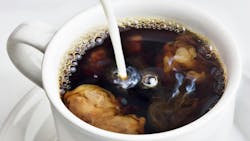 coffee into a cup of coffee stock image coffee into a cup of coffee stock image