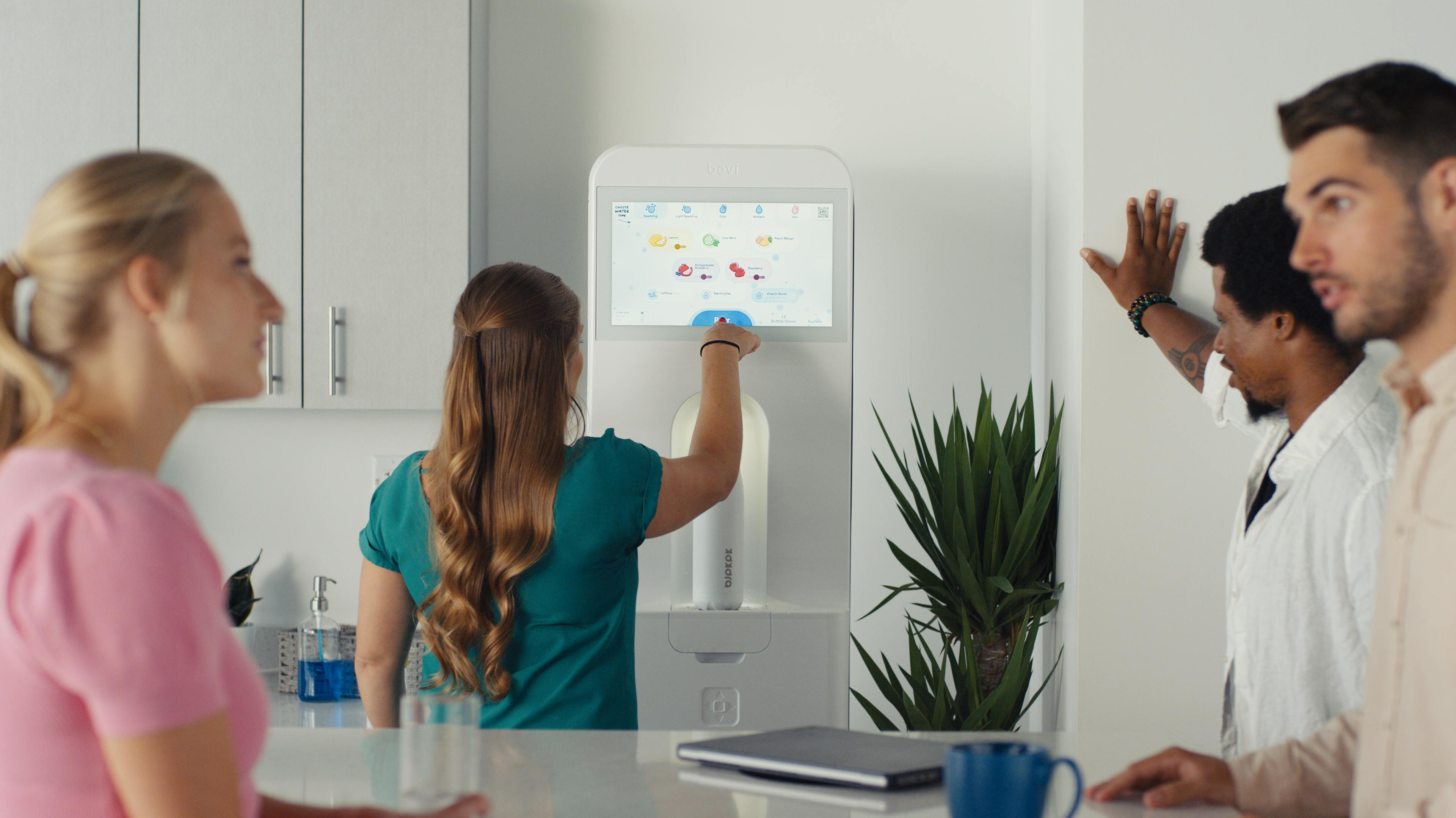 Bevi customer refilling reusable bottle