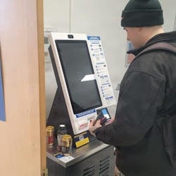 A sailor pays for a purchase in the new micro market in Keflavik, Iceland. A sailor pays for a purchase in the new micro market in Keflavik, Iceland.