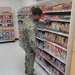 A sailor shops in the new micro market at Keflavik Air Base. A sailor shops in the new micro market at Keflavik Air Base.