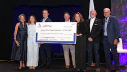 Aspire Bakeries and Otis Spunkmeyer representatives present a check to the Sodexo Stop Hunger Foundation.