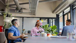 office breakroom three workers eating