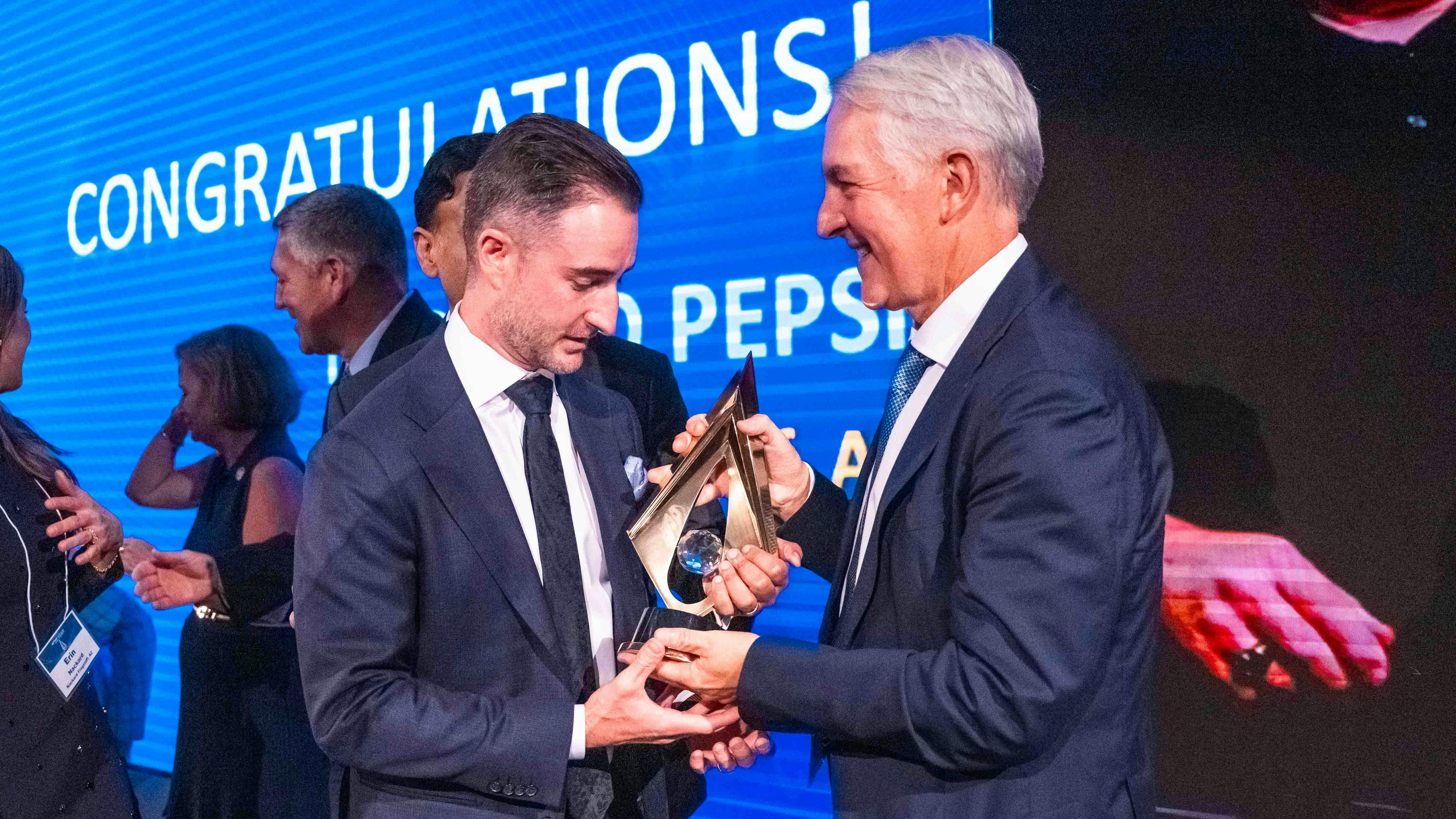 Palmer Nackard accepts 2025 PepsiCo Bottler of the Year award